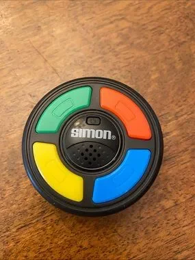 Hasbro | Toys | Free Mini Simon Electronic Game | Poshmark